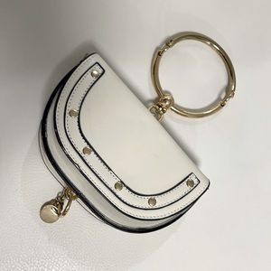 IVORY WRISTLET/CLUTCH WITH GOLD ACCENTS